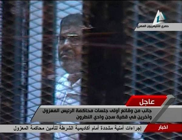 Ousted Morsi in court for jail break trial