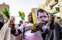 Egypt's Morsi stands trial over espionage