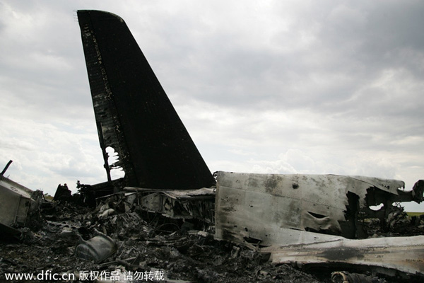 At least 49 killed as transport plane downed in eastern Ukraine