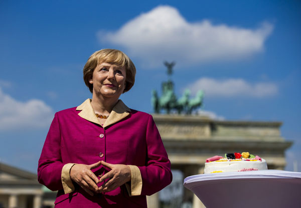 High-flying Merkel to mark 60th birthday