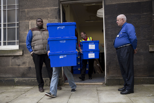 Scots vote in record numbers, await independence verdict