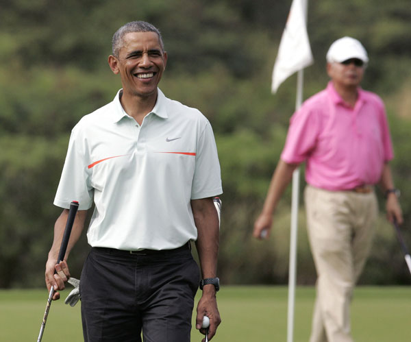 Obama tees off in Hawaii with Malaysian leader