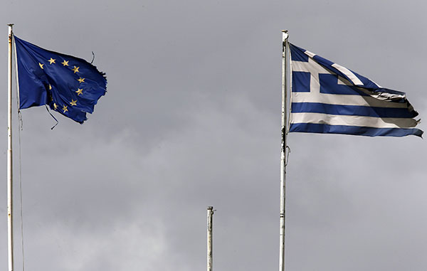 Euro zone backs Greek aid extension, seeks clearer reforms