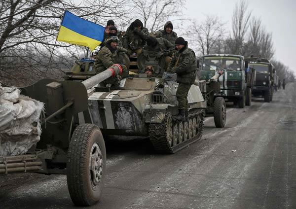 Ukraine starts heavy weapons withdrawal