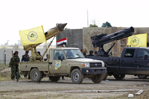 Iraqi forces recapture government HQ in Tikrit