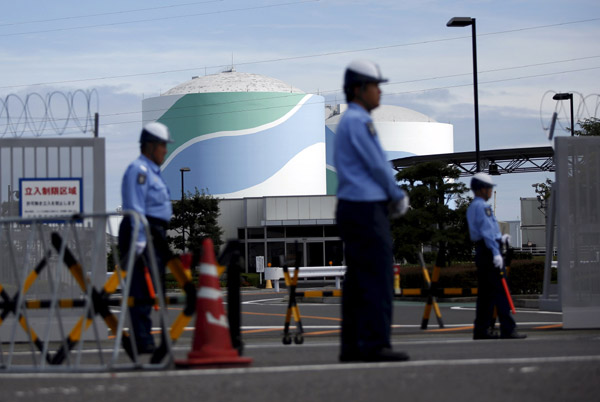 Japan's Kyushu Electric begins loading reactor fuel