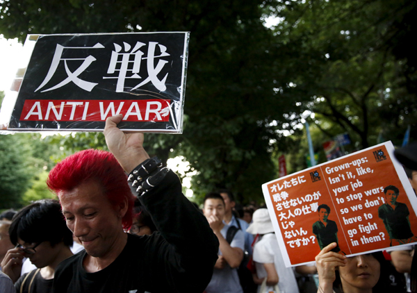 Abe gov't forcing war bills triggers anger