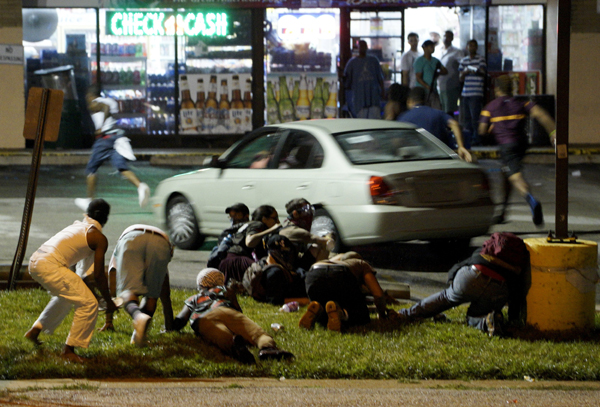 State of emergency called in Ferguson after gunfire mars protests