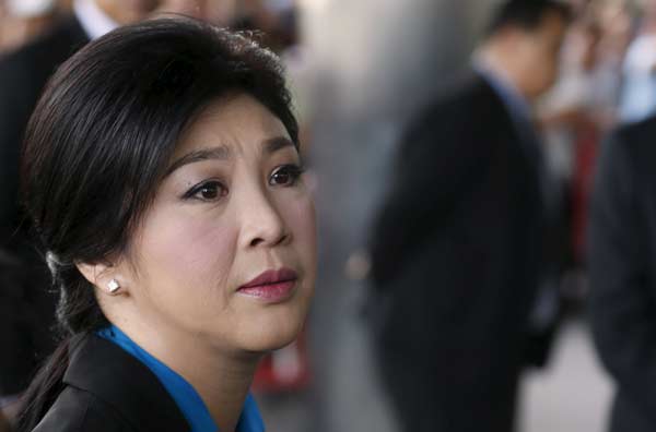Former Thai PM appears at Supreme Court over doomed rice subsidy schem