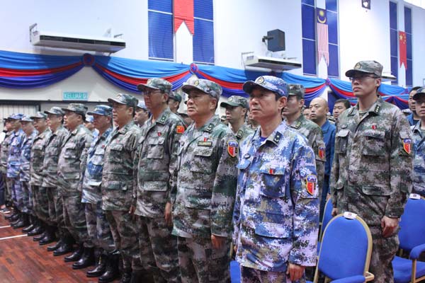 China and Malaysia mark end of first joint military drill