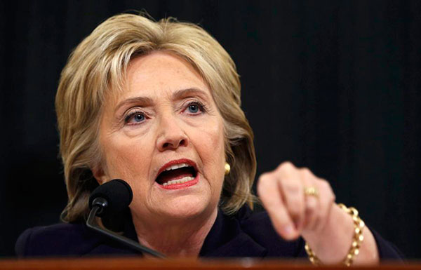 Clinton defends her Benghazi record in face of Republican criticism