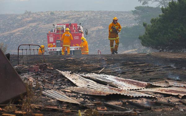 More than 100 homes lost in Australia's Christmas Day bushfires