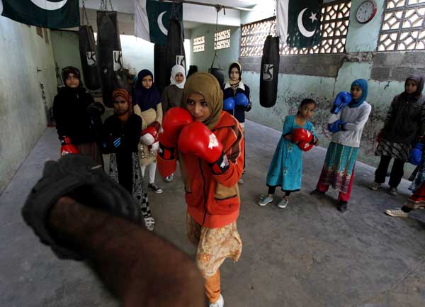 Young female boxers punch through gender barriers