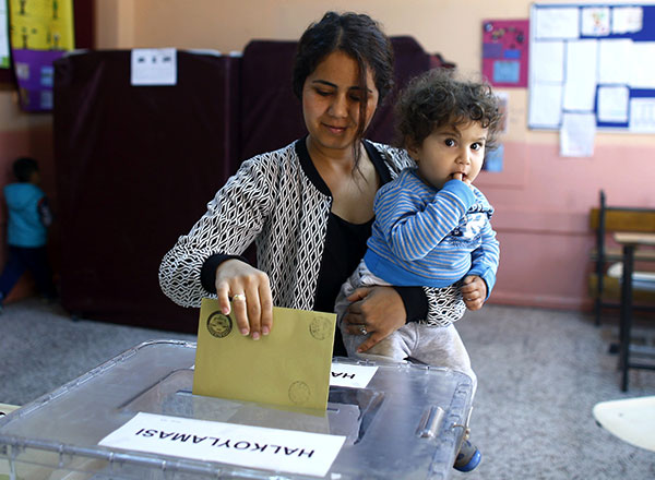 Turks vote on expanding Erdogan's power
