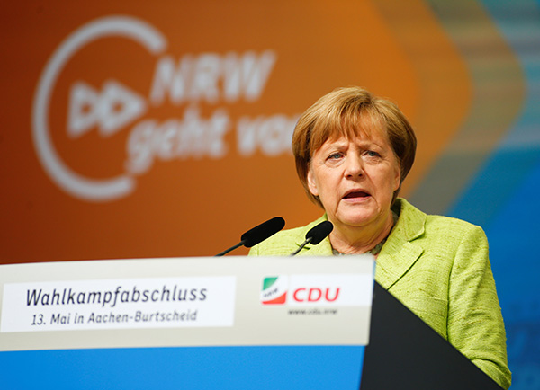 Exit polls show Merkel's CDU wins key German state election