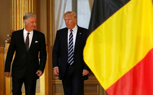 Trump uses tour to rebuild ties with Europe as domestic difficulties mount