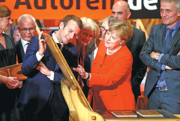 Leaders of Germany and France on same page at launch of book fair