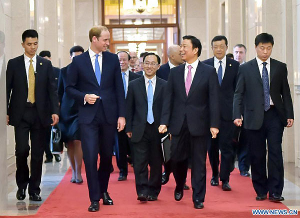 Xi gets royal invitation to visit UK during meeting Prince William
