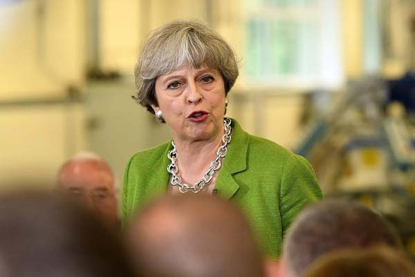 PM May's lead falls to 3 pct points, YouGov poll shows a week before UK election